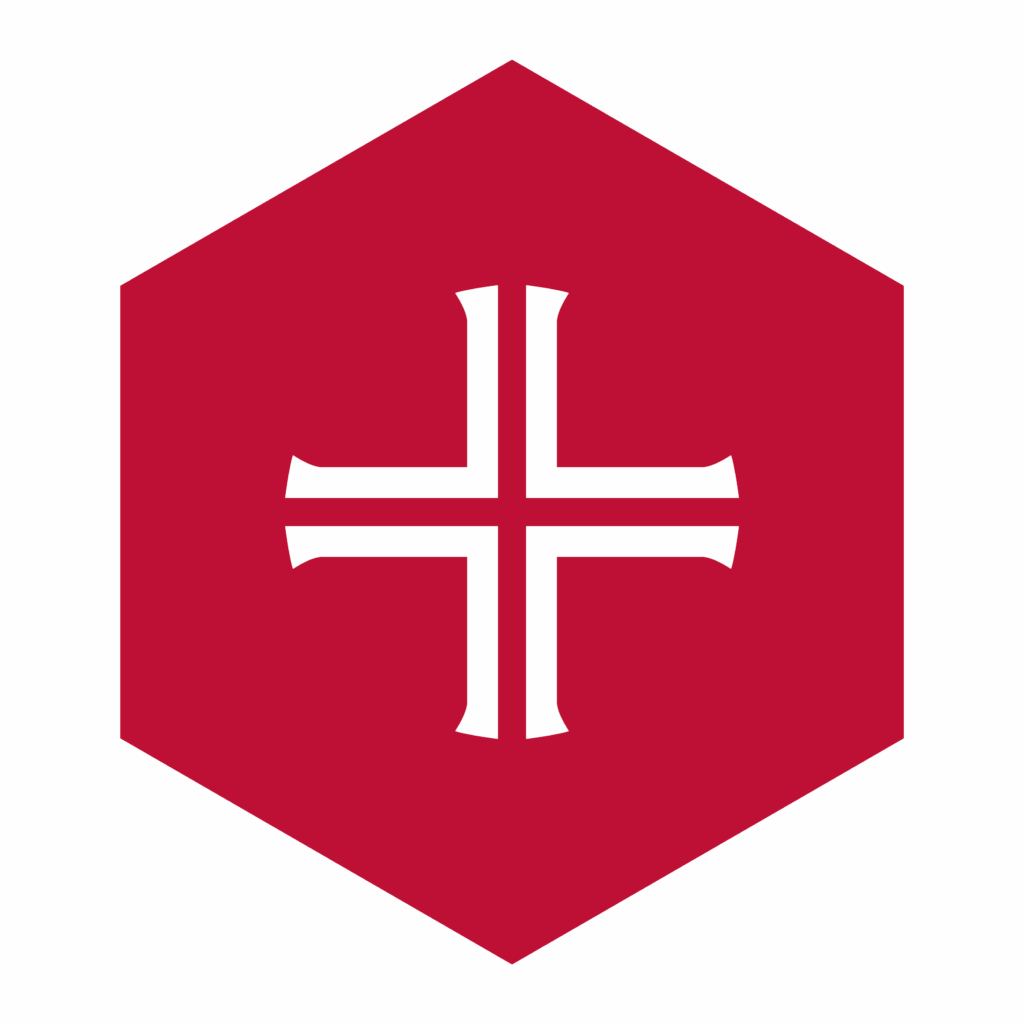 A red hexagon featuring a white symmetrical cross with flared ends at the center.