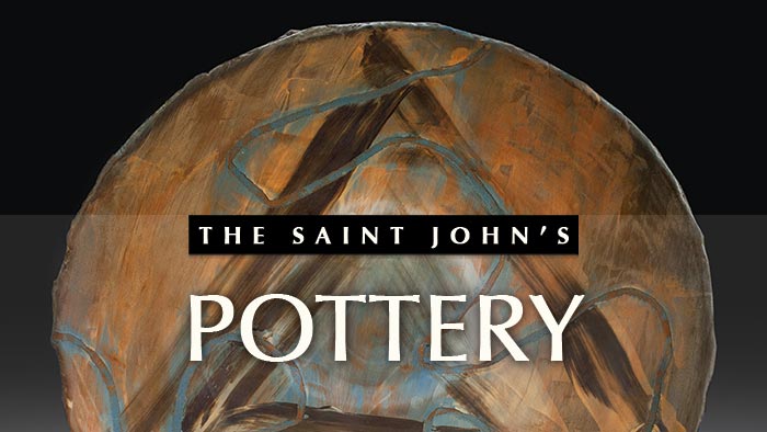 Circular ceramic plate with abstract brown and blue patterns as the background. Overlaid text reads "The Saint John’s Pottery" in bold white and black letters.