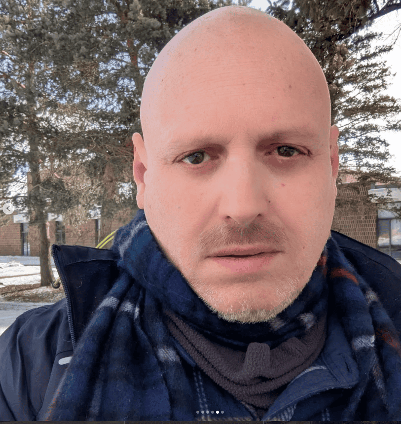 A man taking a selfie.