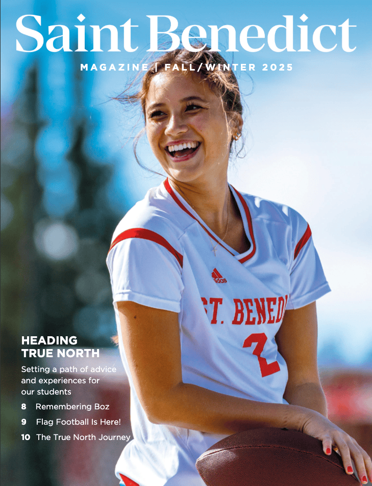 A young woman in a "St. Benedict" sports jersey smiles while holding a football outdoors, featured on the cover of "Saint Benedict Magazine Fall/Winter 2025." Headlines mention advice, flag football, and student experiences.