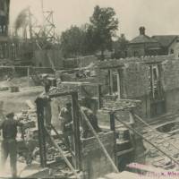 Raising the walls of the lower level of Sacred Heart Chapel