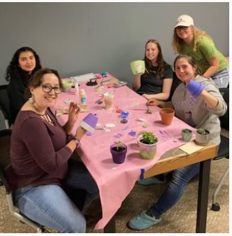 group of women around a table