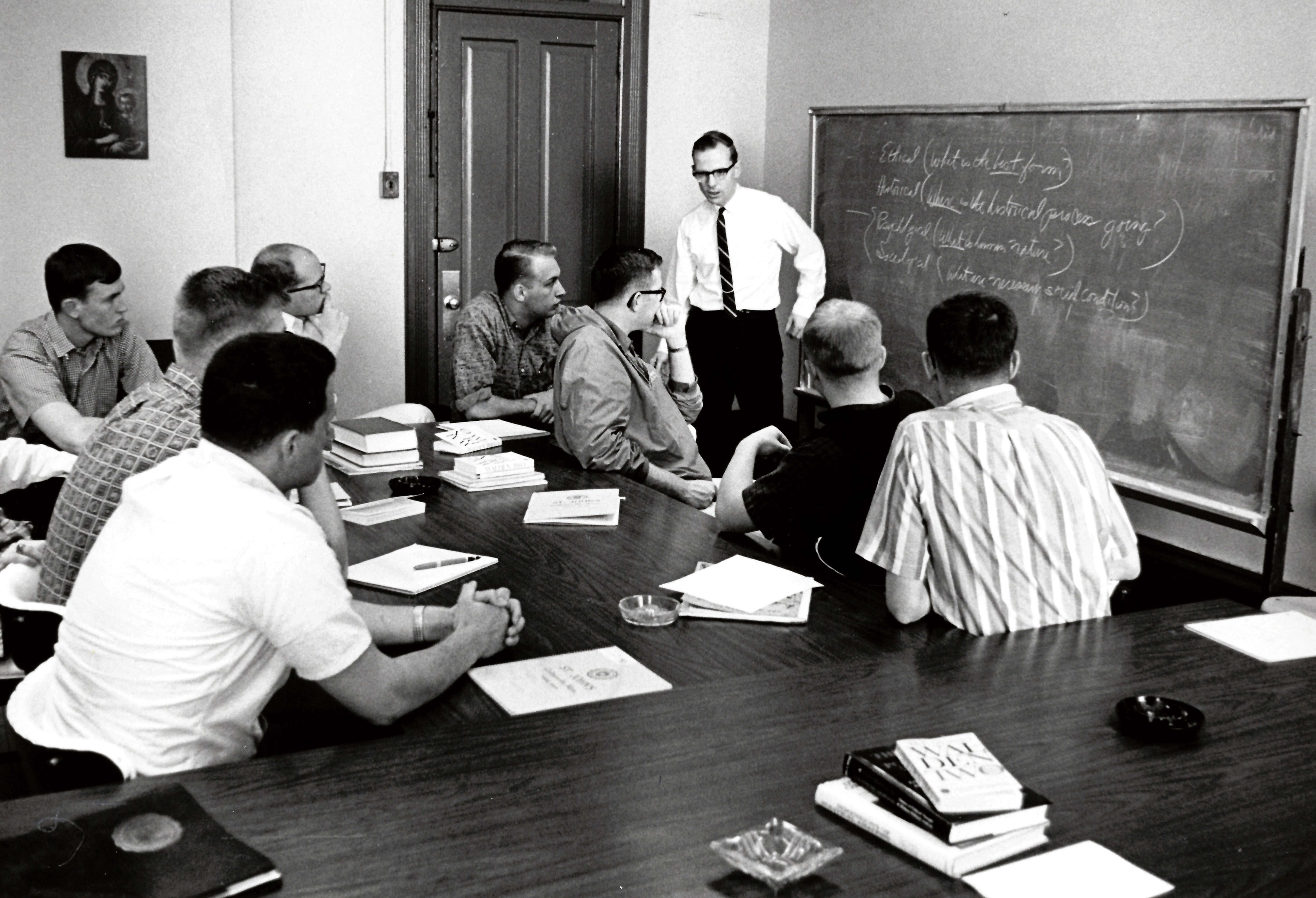 Professor Joe Farry teaching students at Saint John's University