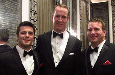 Photo of Carter Hanson, Peyton Manning, and Brandon Novak at the National Football Foundation dinner in NYC