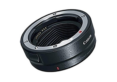 A Canon lens mount adapter, black with metallic inner ring, electronic contacts, and a red alignment dot, designed for attaching different lenses to a camera body.