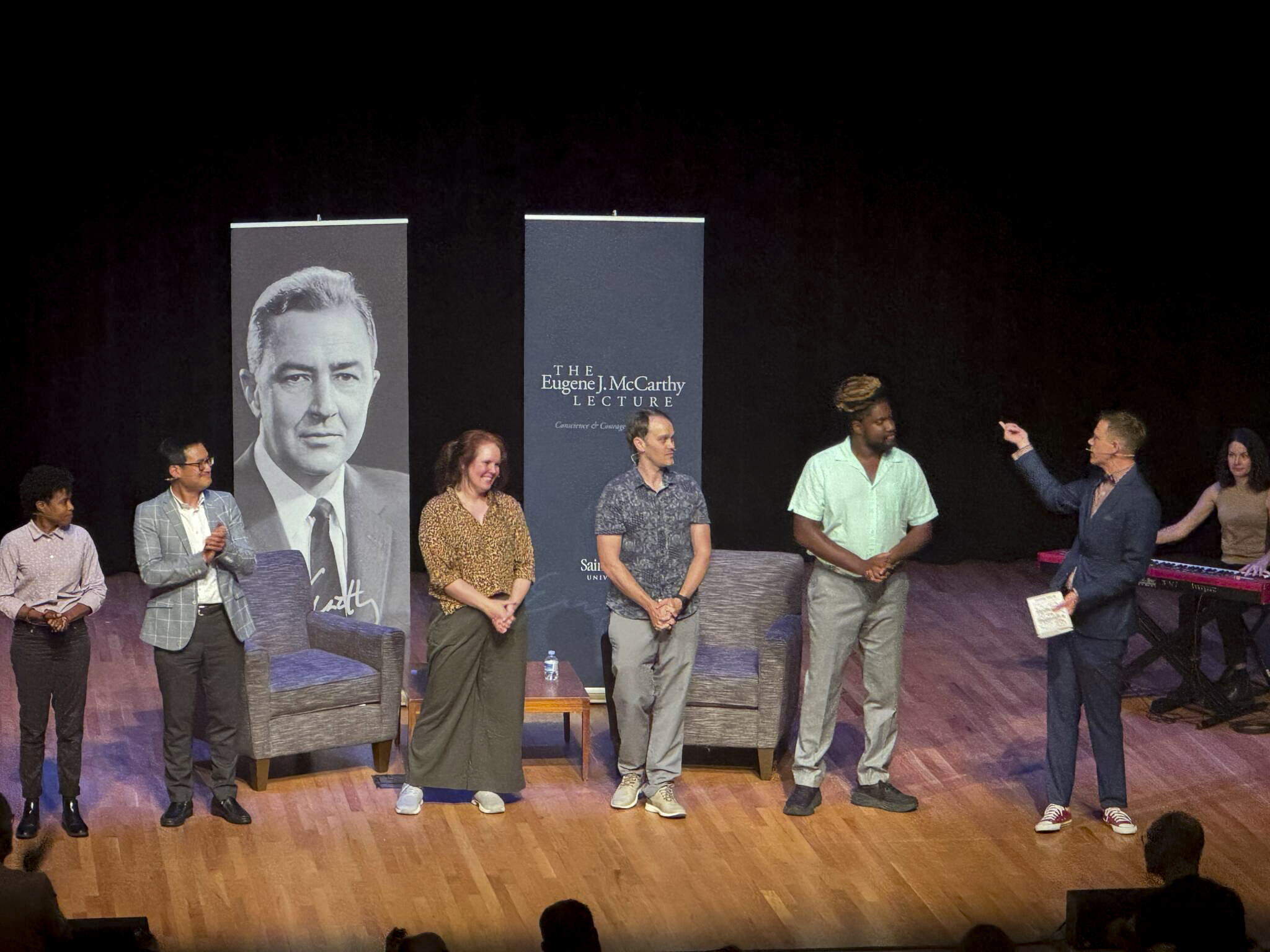 The Theater of Public Policy on stage at the Humphrey Theater for the 18th annual Eugene J. McCarthy Lecture.