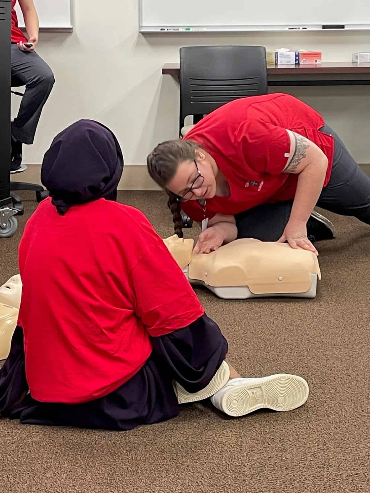 Nursing students discuss CPR
