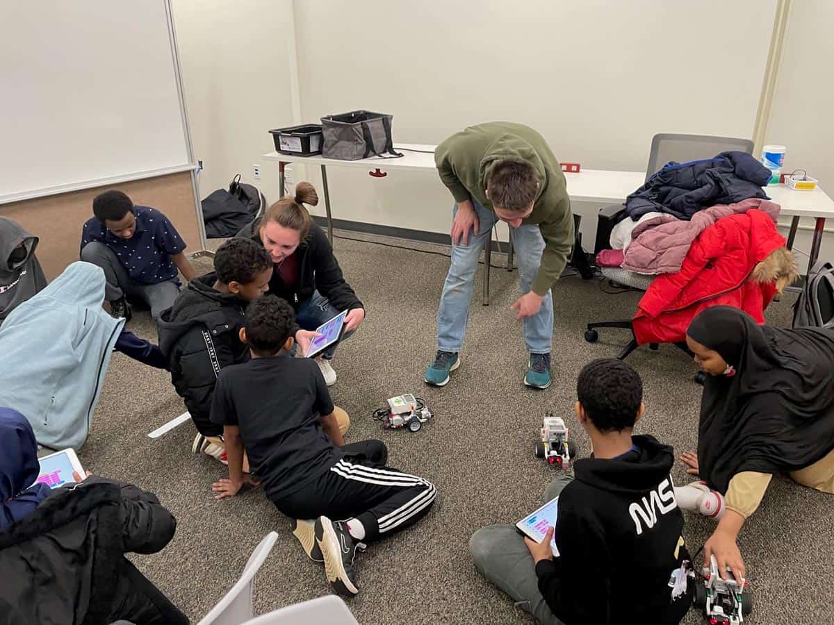 Computer science students demonstrate robots