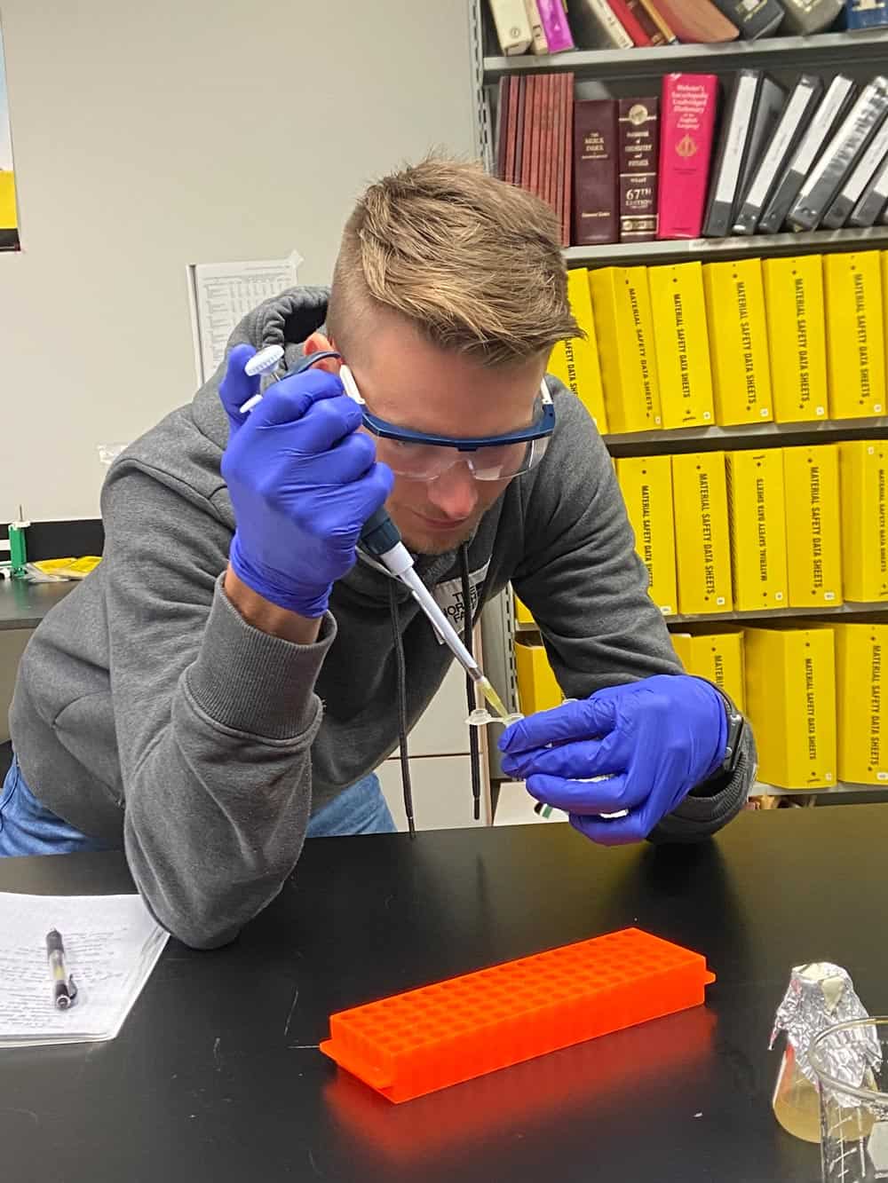 Alex Host working in a lab