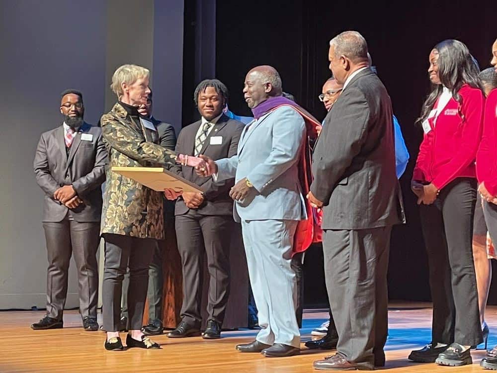Philip Davis receiving doctorate