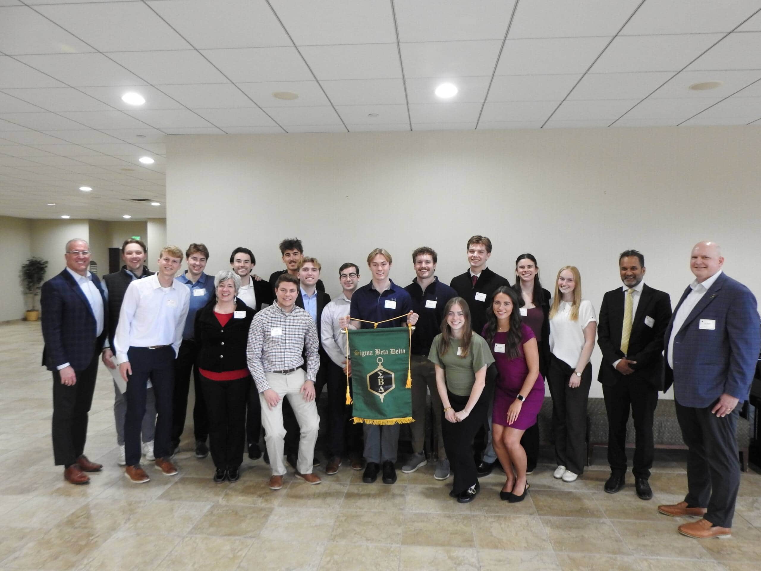 Sigma Beta Delta inducts 26 students, honors alum leaders at annual ceremony